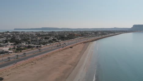 Marine-Drive-Beside-Beach-Coastline-In-Gwadar-With-Traffic-Going-Past