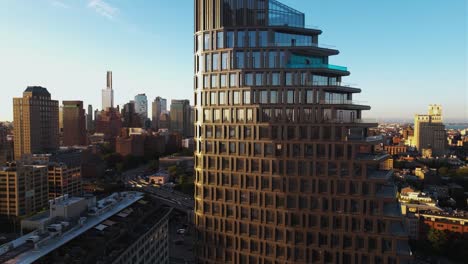 Aerial-view-around-the-Olympia-Dumbo-condominium,-golden-hour-in-Brooklyn,-NY
