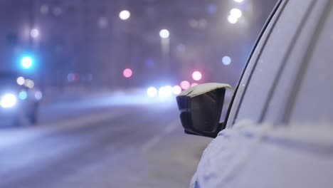 Winter-traffic-hazardous-driving-conditions,-close-up-of-car-with-traffic