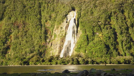 Lady-bowen-falls-in-milford-sound-on-sunny-summer-day-in-New-Zealand