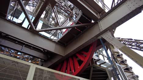Red-Gear-Wheel-Of-Eiffel-Tower-Lift-Rotating
