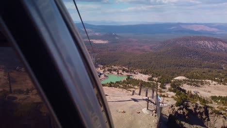Gimbal-static-shot-from-gondola-looking-out-at-the-view-from-11,000-feet-as-it-descends-Mammoth-Mountain-in-California