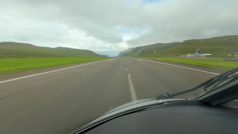 Cockpit-POV-from-Passenger-Airplane-Arriving-at-the-Terminal-of-the-Faroe-Islands-Airport