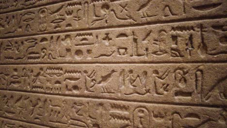 Closeup-Of-Egyptian-Hieroglyphs-And-Ancient-Drawings-On-Clay-Wall