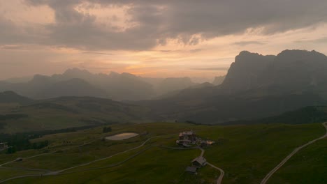 sliding-drone-flight-over-a-valley-in-the-dolomites-in-the-morning-fog