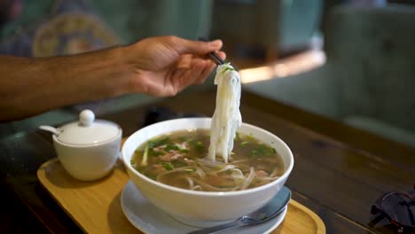 Close-up-delicious-ready-do-eat-Rice-noodles-bowl,-Vietnam-Slow-motion-shot