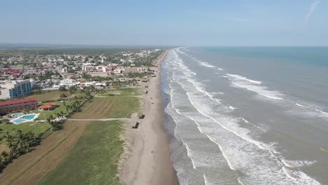 Panoramic-view-of-the-mexican-beach-in-Tecolutla,-wide-shot-of-the-seaside-in-Veracruz-Mexico