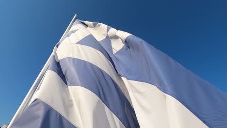 Greek-Flag-Billowing-Against-Sunny-Blue-Sky