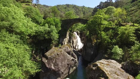Drone-Footage-Bridge-Over-Waterfall