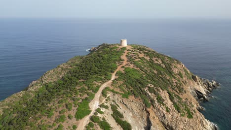 Capo-Malfatano-Tower-at-South-Coast-of-Sardinia,-Italy---4k-Aerial