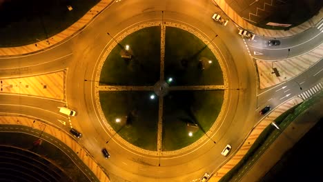 Aerial-view-of-a-roundabout-at-night-in-Salamanca,-Spain