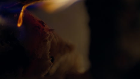 Slow-motion-shot-of-flames-and-embers-in-a-fireplace