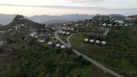 Orbit-reveal-drone-shot-of-the-camping-village-in-the-Thailand