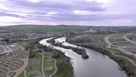 "Tormes"-river-next-to-the-city-of-Salamanca-in-Spain,-aerial-drone-view