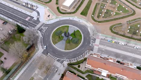 Aerial-view-of-roundabout-in-Salamanca,-Spain,-rotating-motion