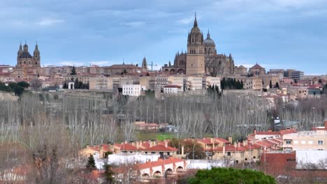 Aerial-drone-view-of-Salamanca-city,-Spain-on-a-cloudy-day