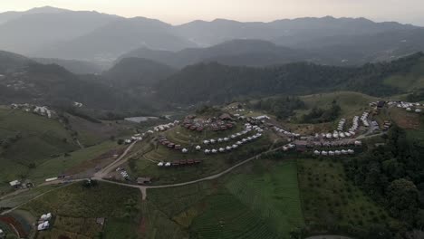 Orbit-reveal-shot-of-the-mountain-tent-village-in-the-Northern-Thailand