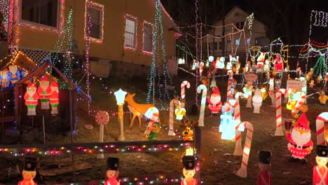 Stunning-Holiday-Lights-And-Christmas-Decorations-At-Night-Outside-A-House-In-The-USA