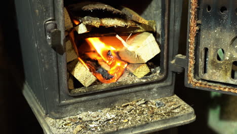 House-heating-by-burning-firewood-in-the-metal-stove