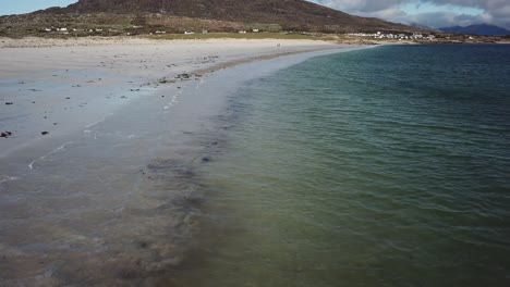 aerial-view,-sandy-beach-and-waves-from-the-atlantic-ocean-in-Ireland,-Connemara