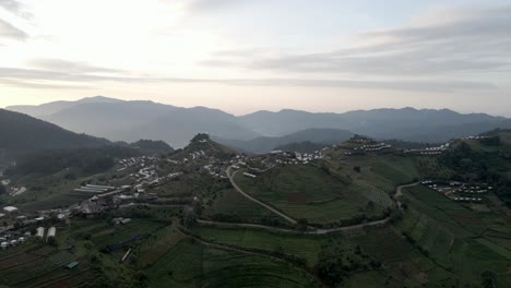 Orbit-drone-shot-of-the-mountain-village-in-the-Northern-Thailand