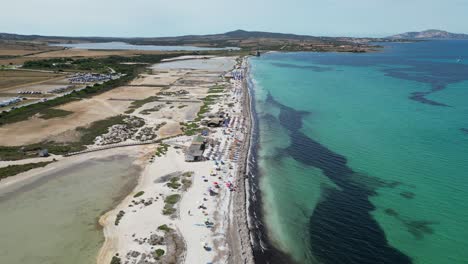 Bagno-Sardigna-Beach-and-salt-lakes-in-Stintino,-Sardinia,-Italy---4k-Aerial