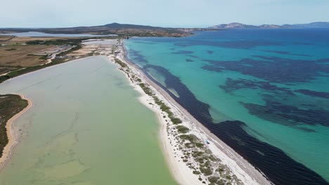 Big-Salt-Lake-and-Bagno-Sardigna-Beach-in-Stintino,-Sardinia,-Italy---4k-Aerial