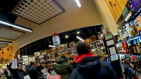 point-of-view-time-lapse-of-a-person-shopping-at-local-grocery-store-for-alcohol
