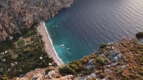Aerial-view-of-turquoise-water-beach-on-the-Turkish-coast-of-Oludeniz,-Kabak-beach