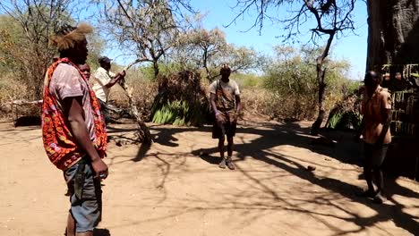 Hadzabe-African-tribe-dancing-for-the-tourists-in-rural-bush-village