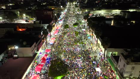 Aerial-view-of-a-crowd-of-believers-queuing-on-the-streets-of-Guadalupe,-Pilgrimage-Virgin-Day-night-in-Mexico-city