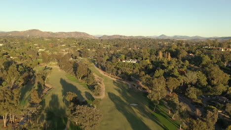 Aerial-drone-video-over-a-golf-course-in-Rancho-Santa-Fe,-California