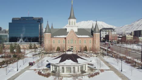 Provo-City-Center-LDS-Mormon-temple-and-snowy-plaza-on-sunny-day,-Utah