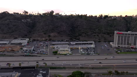 Car-dealership-and-hotel-in-San-Diego-next-to-Highway-interstate-8-in-Mission-Valley