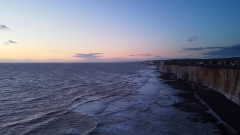 Wide-angle-aerial-view-chalk-cliffs-on-south-coast-of-England-at-sunset