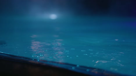 Closeup-of-Bubbles-in-pool-at-night