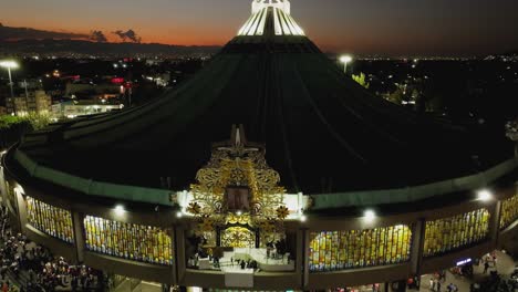 Aerial-view-in-front-of-the-Basílica,-feast-of-the-Virgen-de-Guadalupe-night-in-Mexico-city