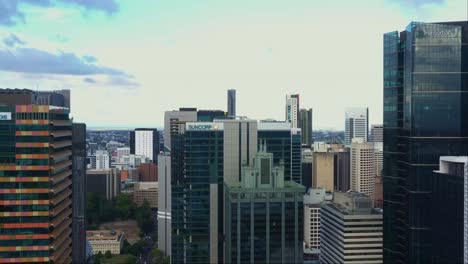Aerial-elevation-shot-capturing-populous-downtown-cityscape-of-central-business-district-cbd,-Brisbane-city-view-from-above,-Queensland,-Australia