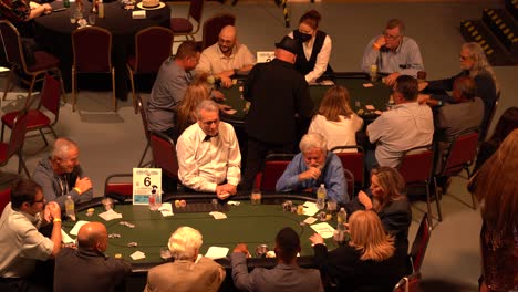 people-playing-poker-at-table