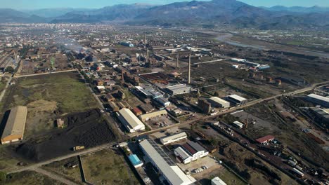 Factory-industrial-zone,-steel-processing-factory-warehouses-near-city-of-Elbasan,-Albania