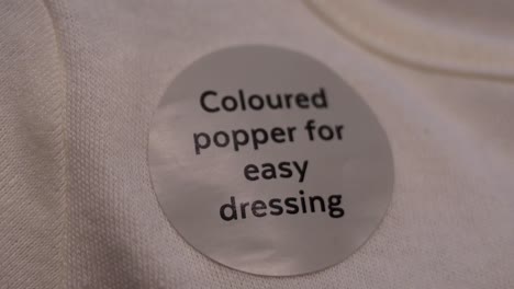 Coloured-popper-for-easy-dressing,-United-Kingdom