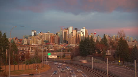 Colourful-warm-sunrise-or-sunset-timelapse-in-the-city-during-the-fall-in-October-in-Calgary,-Alberta,-Canada