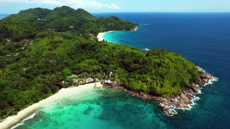 Drone-shot-of-2-beaches-in-the-south-west-coast-of-The-island,-Seychelles-the-intendance-and-Takamaka-beach-reveal-shot