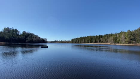 Beautiful-evergreen-forest-lake-in-Orust,-Sweden