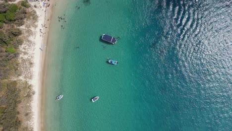 Artistic-spinning-drone-view-of-a-popular-holiday-spot-and-safe-harbor