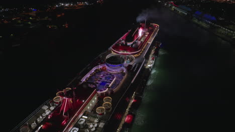 Virgin-Voyages-liner-sailing-in-Atlantic-ocean-at-night