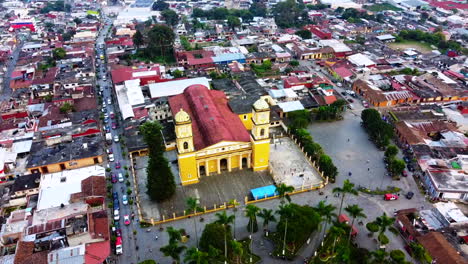 beautiful-aerial-view-with-drone-of-flying-overt-Saint-John-the-Baptist-Parish-of-Coscomatepec,-Veracruz,-Mexico