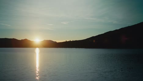 Sunrise-over-Lake-Hemet,-San-Jacinto-mountains