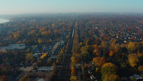 High-aerial-view-over-Mississauga,-Ontario-on-a-sunny,-autumn-morning
