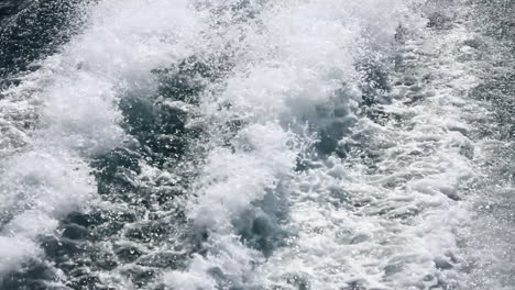 Wake-Waves-Form-Alongside-Boat-on-Ocean